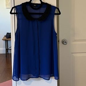 Sheer blue camisole with black lace collar